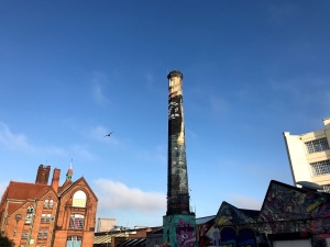 A photo outside of the custard factory with blue skies
